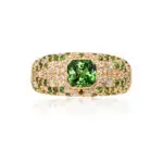 Asscher cut tsavorite dome ring with paved diamonds and tsavorites in yellow gold band