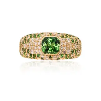 Asscher cut tsavorite dome ring with paved diamonds and tsavorites in yellow gold band