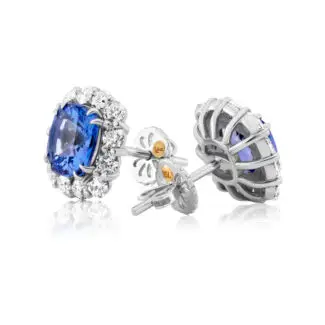 Cushion cut sapphire studs with diamond halo set in white gold