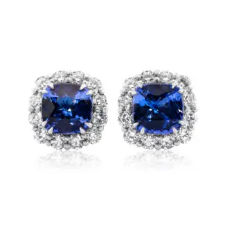 Cushion cut tanzanite studs with diamond halo set in white gold