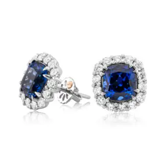 Tanzanite studs in white gold with a diamond halo