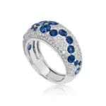 Royal blue sapphire dome ring with round cut diamonds and sapphires