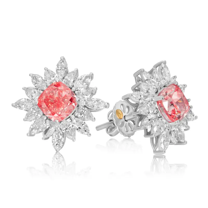 Pink Diamond Studs featuring vivid pink cushion cut diamonds, surrounded by a halo of pear and marquiese-cut diamonds