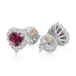 Rhodolite studs featuring purplish pink garnets surrounded by a halo of diamonds